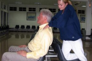Photos show Bill Clinton getting massage from Epstein accuser