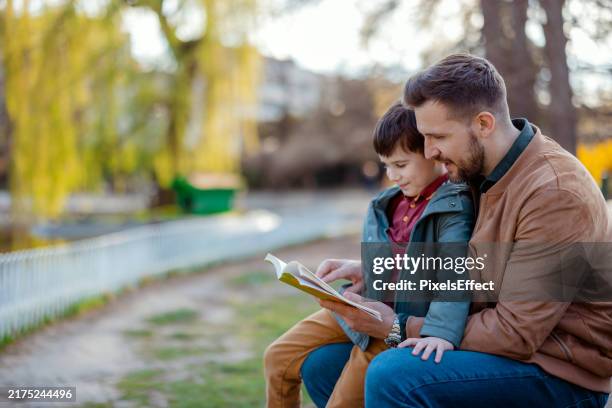 560 Toddler Reading Outside Stock Photos, High-Res Pictures, and ...