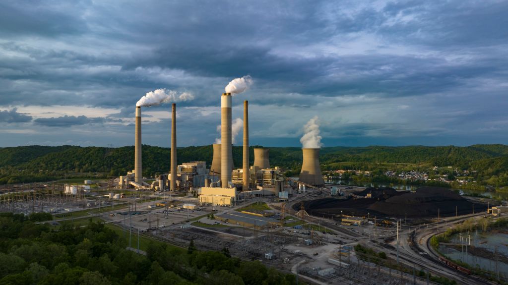 Aerial view of Jon Amos Power plant shows smoke stacks and cooling, Coal, Poca, West Virginia
