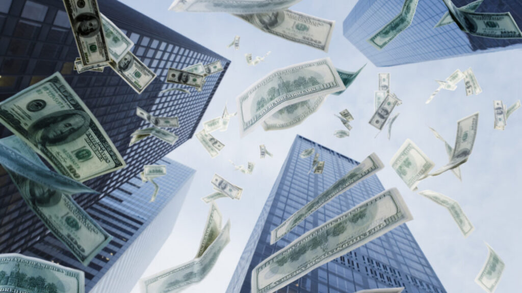 One hundred dollar bills falling from sky