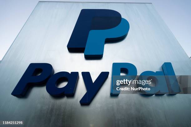 PayPal logo can be seen at its office in San Jose, California ...