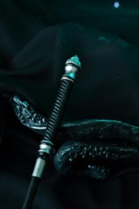 The top of the magic wand is decorated with decorative spiral ...