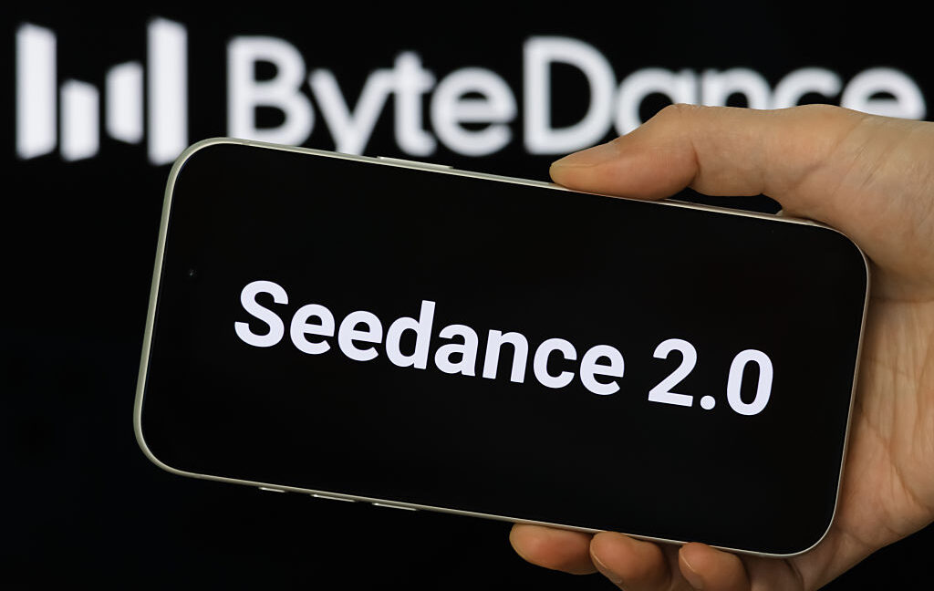 Seedance 2.0 Shown On Smartphone With ByteDance Logo In Background