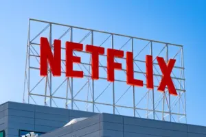 Why did Netflix back down from its deal to acquire Warner Bros.?